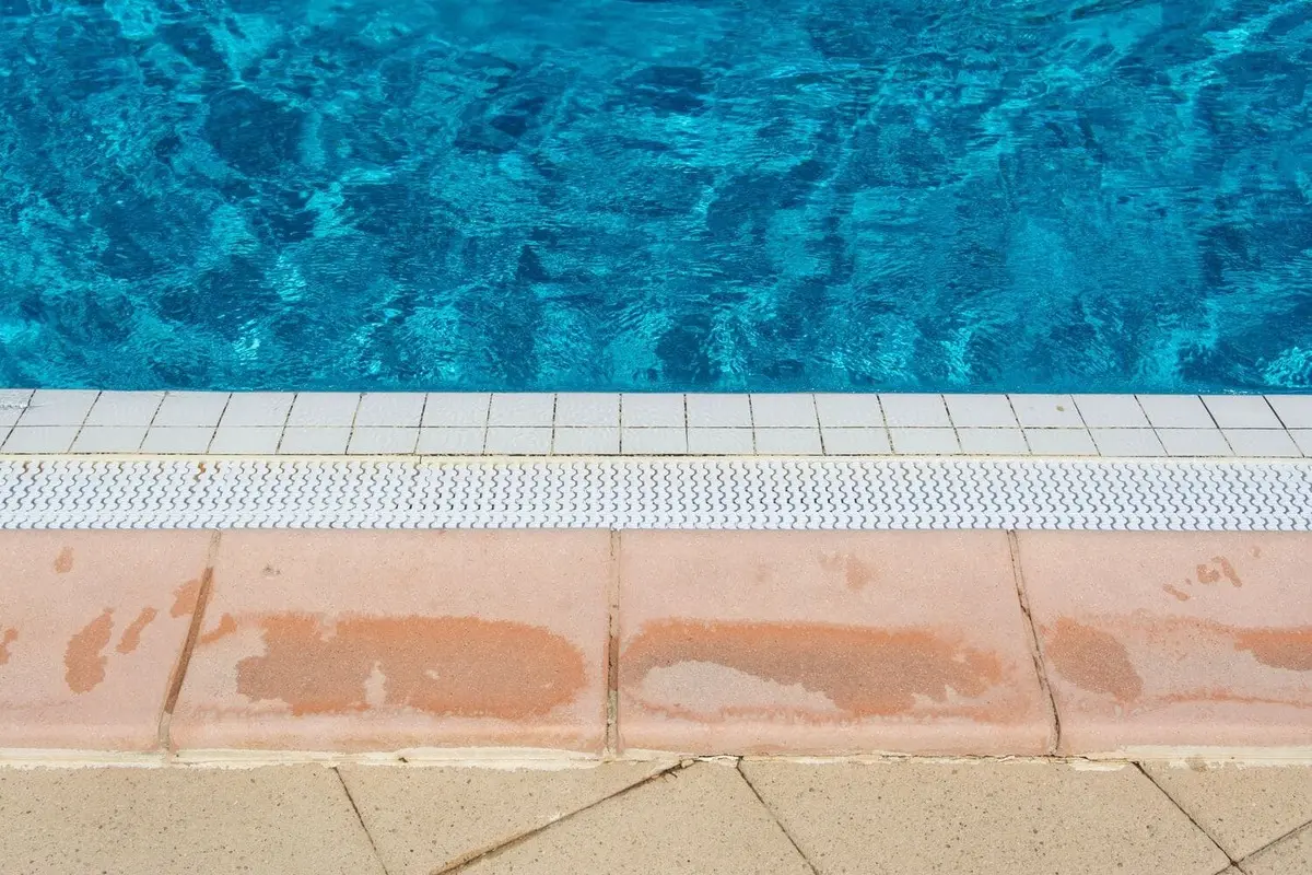 calcium buildup on pool tile