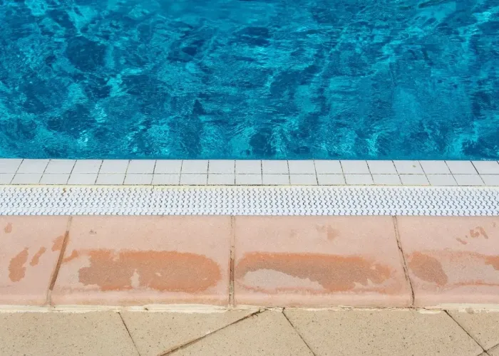 calcium buildup on pool tile